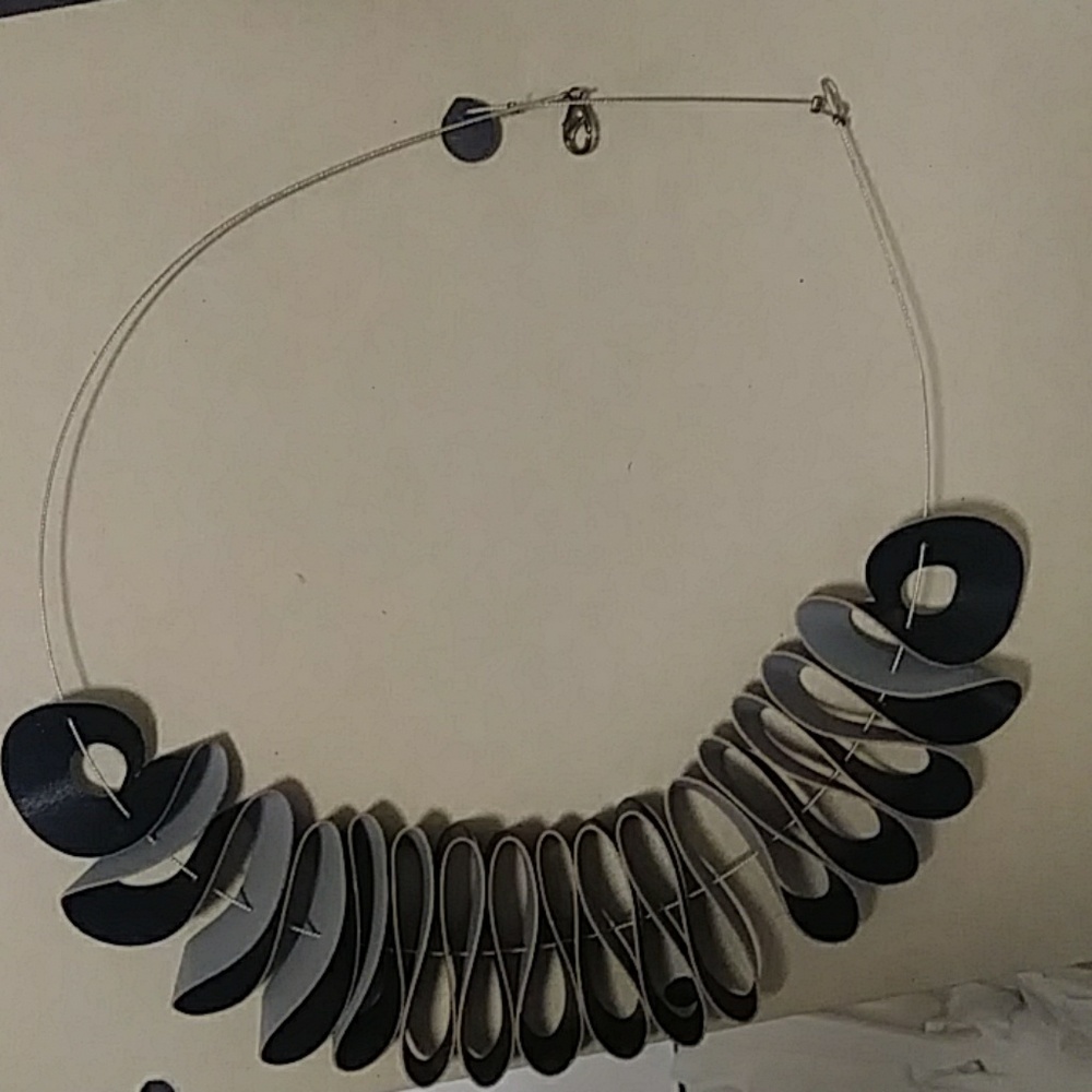 Accordion shaped leather necklace